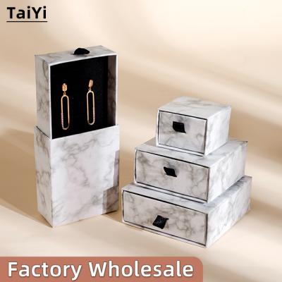 China Wholesale Hot Sale Luxury Necklace Earring Ring Bracelet Sliding Packaging Luxury Gift Drawer White Marble Jewelry Box With Custom Logo for sale