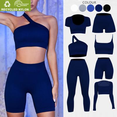 China Low MOQ Breathable Eco-friendly Fabric Recycled Nylon Fabric Yoga Wear Fashion Design One Shoulder 6 Piece Seamless Active Wear Yoga Sets for sale