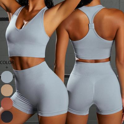 China 2022 Newest Design Breathable Seamless Hip Lifting Shorts Yoga Set Women Fitness Yoga Bra Top Seamless Yoga Set for sale