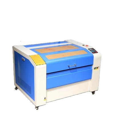 China Air Cooled 6090 Laser Engraving Machine Morocco Paper Cutting for sale