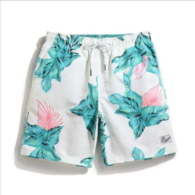 China Plus Size 2021 New Couples Beach Pants Quick-drying Five-point Surfing Swimming Trunks Men's Loose Seaside Beach Swimming Trunks for sale