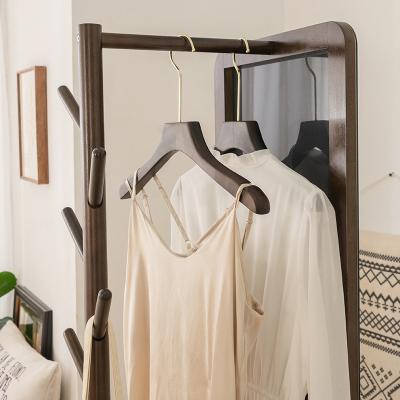 China Hot Selling Rotating Floor Stand Wooden Integral Rotatable Dressing Mirror With Coat Rack for sale