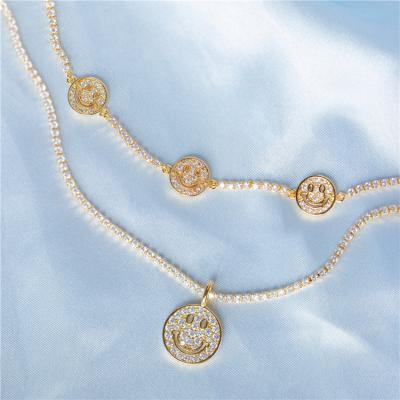 China Hot Selling BOHEMIA PS Brass Made Claw Chain Necklace Crystal Zirconia Smiling Face Pendant Necklace 18K Gold Plated for sale