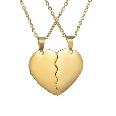 China Europe and America Personalized Laser Name Couples Necklace Jewelry Stainless Steel Laser Engraved Name Magnetic Heart Pendant Necklaces for sale