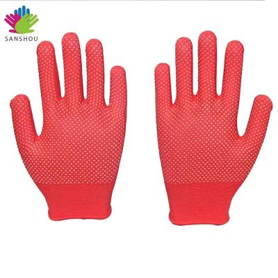 China Industrial seamless twine knit red knitted nylon work glove with PVC dots on palm for sale