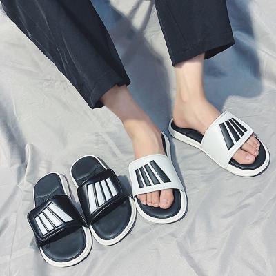 China Fashion Trend Summer Unique Thick Tasteless Durable Lightweight Bedroom EVA Letter Men's Transparent Slippers for sale