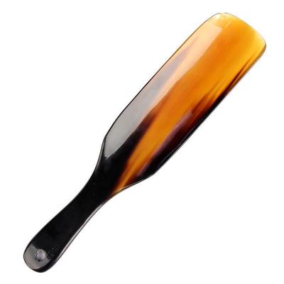 China Easy On/Off Hand Crafted Natural Luxury Shoe Horn Cow Horn Custom Shoe Horn for sale