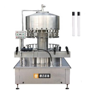 China Automatic Food Glass Bottle Spirit Wine Filling Machine Into Small Tube Bottle for sale