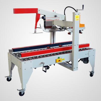 China High Quality Electric Automatic Food Carton Box Packing Sealing Machine for sale