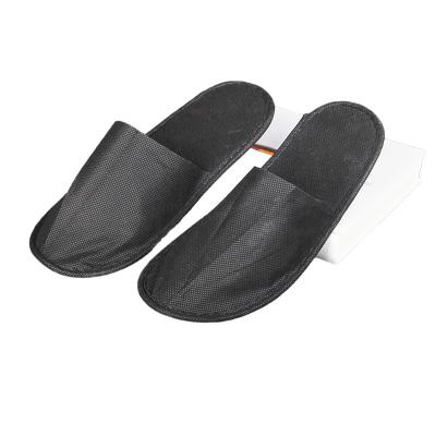 China Cheapest Narrow Toe Stock Nonwoven Eva Disposable Hotel Slipper for sale