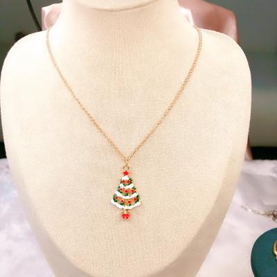 China Other Cartoon Jewelry Wholesale Free Sample Beautiful Color Christmas Oil Drop Christmas Tree Earrings Necklace Set for sale