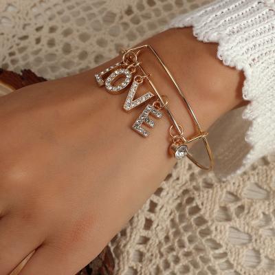 China Vintage free sample Bohemian simple alloy letter love retro European and American open bangle bracelet wholesale for sale