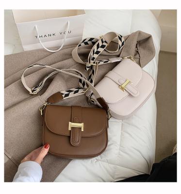 China 2021 Mini Saddle Bag High Quality Pure Custom Bucket Bag Simple Color Fashion Cross - Body Purse For Women for sale