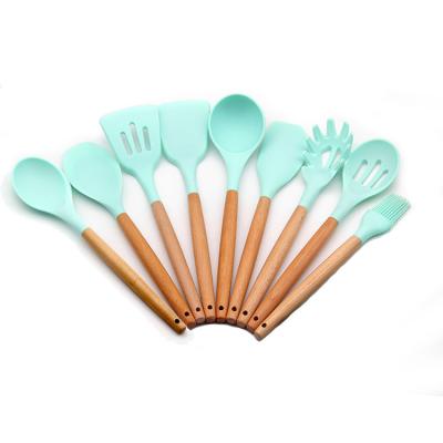 China Sustainable Hot Sale Cookware Silicone Utensils With Wooden Handles Cookware Set for sale