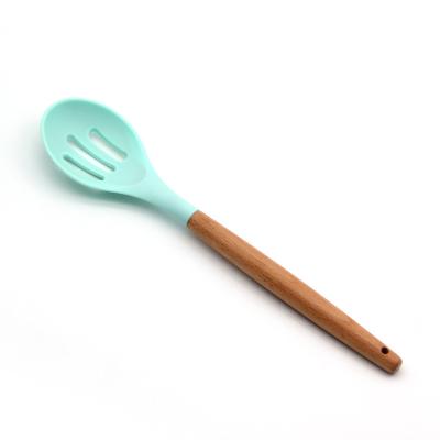 China Sustainable Serving And Slotted Spoons Silicone Slotted Spoon With Wooden Handle for sale