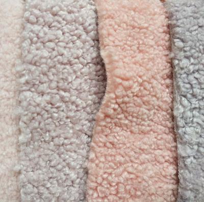 China Garment Stock Imitation Lamb Fur Wool Fabric Small Faux for sale