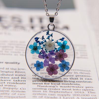 China Dry Flowers Wholesale Creative Dry Flower Plant Resin Necklace Metal Jewelry Sweater Pendant Chain for sale