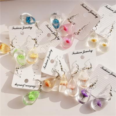 China European and American foreign trade romantic border source flower earrings manual epoxy dry resin real flower earrings for sale