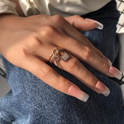 China Female creative hot selling zircon main ring hyperbole fashion personality lock cold wind ring index finger ring for sale