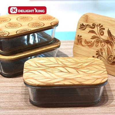 China Freshness Preservation Customized Design Heat Resistant Glass Food Container With Customized Laser Patterns Bamboo Lid for sale