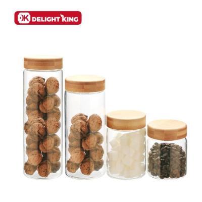 China Sustainable kitchen storage borosilicate glass jar with lid bamboo storage glass jar with lid bamboo storage for sale