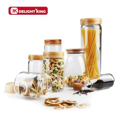 China Freshness Preservation High Quality Borosilicate Round Storage Glass Jar With Bamboo Wooden Lid/High Quality Glass Storage Bottles And Jars for sale