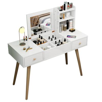 China Multifunctional Dressing Table Mirror Bedroom Dresser With Simple Modern Mirror Drawer Storage Cabin Clamshell Mirror Dressing Table for sale