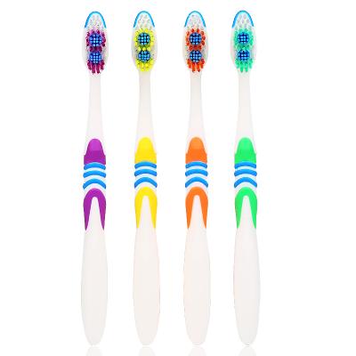 China Disposable adult toothbrush with gum massage for sale