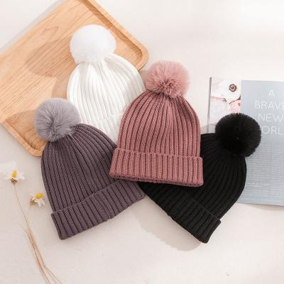 China COMMON Fashion White Chunky Knitted Hat Faux Fur Thick Beanie Winter Hats for sale