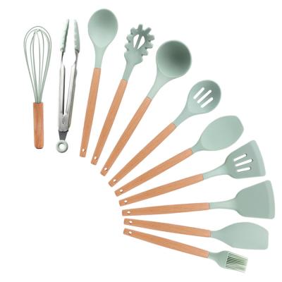 China Food Grade Silicone Sustainable Reusable Adaptive Kitchenware Set Non Stick Kitchen Utensils Set For Cooking for sale