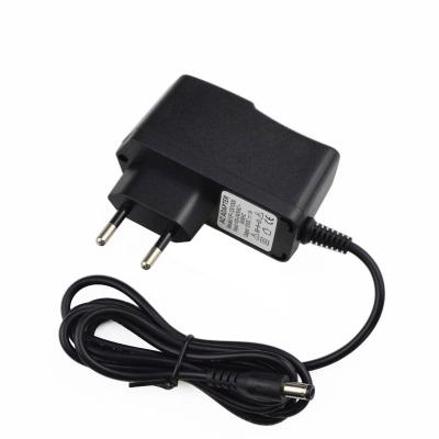 China 3V 4.2V 5V 6V 8.4V 9V 12V 1A 2A Power Adapter Changeover Power Supply PW-0312-0505-2 for sale