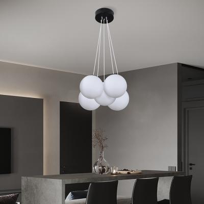 China Skycam OEM/ODM Contemporary Simple Style Chandelier Classic Home Decor E27 Round Ball White Modern Glass Pendant Light for sale