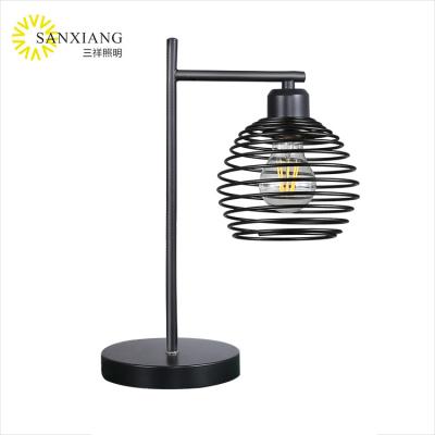 China Skycam Industrial Design Vintage Desk Lamp Metal Cage Shade Table Lamp Modern Stylish Bedside Desk Lamp for sale