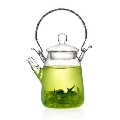 China Sustainable High Borosilicate 300ml Heat Resistant Teapot With Infuser Teapot With Glass Cup Teapot Set for sale