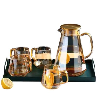 China High Sustainable Borosilicate Glass Teapot Set Drinking Pot With Cup And Holder for sale