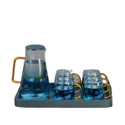 China Sustainable Beverage Set GLASS Water Jug With Cup And Metal Holder And Wooden Tray for sale