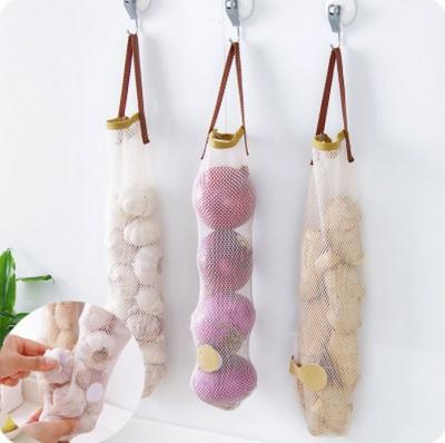 China Kitchen Accessories Organizer Reusable Vegetable Fruits Viable Net Mesh Hanging Storage Bag for Garlic Onion Storage for sale