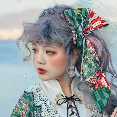 China Fashion With Arrow Chic Lolita Handmade Half Bowknot Headdress Japanese Style Collection Fashion Patterned Color Blocking Hair Accessory for sale