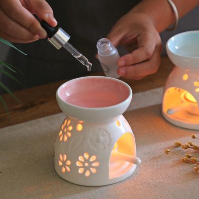 China AROMATIC Pink Blue Ceramic Tealight Candle Holder Ceramic Aroma Oil Censer Holder Set with Essential Oil for sale