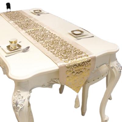 China Beautiful Eco-friendly Gold Stamping Table Runners With Tassel Modern Simple Classic Style Table Runner for sale