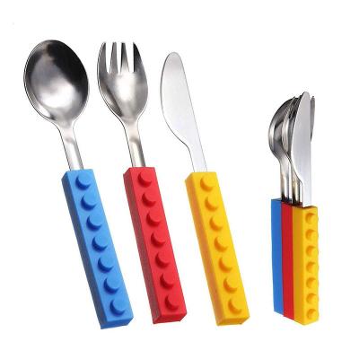 China Viable Silicone Baby Food Supplement Tableware Children's Spoon Baby Building Block Three-Piece Fork and Knife Spoon for sale