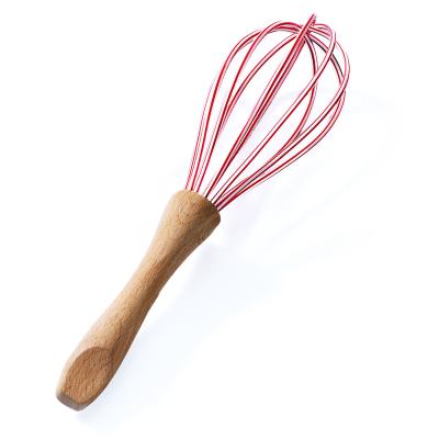 China Viable Kitchen Utensil Novelty Silicone Egg Beater With Wooden Handle for sale