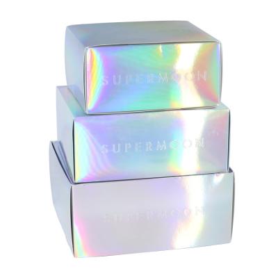 China Biodegradable Hot Selling Holographic Laser Paper Packaging Box Boxes Cosmetics Beauty Care Holgographic Printed Paper Packaging Box for sale