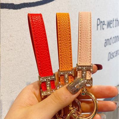 China Luxury Car Female Exquisite Creative Single Key Key Chain Belt America MIKKI H Diamond Key Chain Belt Pendant Cute Pendant for sale