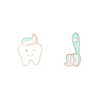 China High Quality America Ready To Ship Cute Dentist Enamel Metal Lapel Soft Medical Badge Tooth Pins for sale