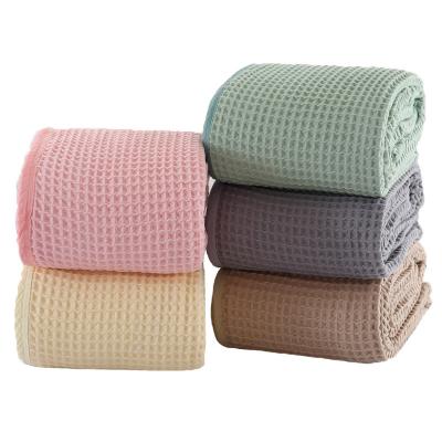 China Sustainable Soft Waffle Towel Single Blanket Beach Bathing Weave Newborn Cotton Baby Blanket Comforter for sale