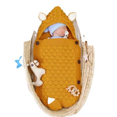 China Winter Breathable Newborn Sweater Cartoon Hooded Wraps With Ear Tails Adjustable Wrap Sleep Knitting Bags for sale