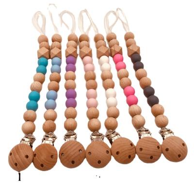 China BPA Free Custom Beech Wooden Teethers Beads Dummy Bibs Baby Pacifier Clip Chains for sale