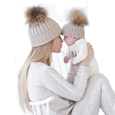 China COMMON Classic Parent-child Family Matching Hats Set Knitted Jacquard Winter Bobble Hats Woman for sale