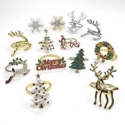 China Metal Alloy Christmas Napkin Holder Ring Christmas Tree Deer Snowflake Viable Napkin Ring For Winter Festival Christmas Table Decoration for sale